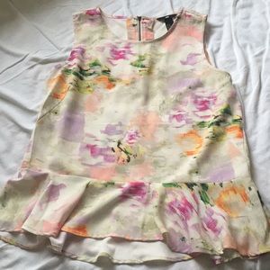 Sleeveless peplum blouse